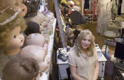 Maria Peck poses for a photo at her shop, Tiara Day, in downtown Frederick. She describes the shop as ‘where vintage glamour meets Paris romance with a twist of gothic beauty.’