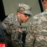 APTOPIX Manning Wikileaks Army Pfc. Bradley Manning is escorted from a security vehicle to a courthouse in Fort Meade.