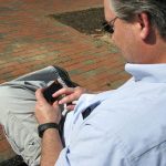 Jim Green, a St. Mary's County resident, stares at his iPhone screen in Lafayette Park as he plays Angry Birds, one of the most downloaded applications in the iPhone's App store.