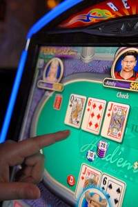 Video poker and other games are not illegal – but it is against the law when the devices pay out winnings. (File photo)
