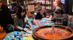 In this April 17, 2015 photo, a dealer counts chips during a game of roulette at the Tropicana Casino and Resort in Atlantic City, N.J. (AP Photo/Wayne Parry)