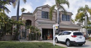 FILE - This Thursday, May 26, 2016, file photo shows a home for sale in Carlsbad, Calif. On Thursday, Oct. 13, 2016, Freddie Mac reports on the week’s average U.S. mortgage rates. (AP Photo/Lenny Ignelzi, File)