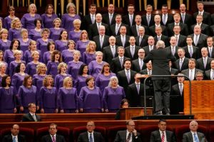 In this Oct. 6, 2018 file photo, female and male members of The Tabernacle Choir perform during the twice-annual conference of The Church of Jesus Christ of Latter-day Saints in Salt Lake City. Women in the Mormon church are barred from being priests, leading local congregations or holding the top leadership posts in a faith that counts 16 million members worldwide. The highest-ranking women in the church oversee three organizations that run programs for women and girls. These councils sit below several layers of leadership groups reserved for men. (AP Photo/Rick Bowmer, File)