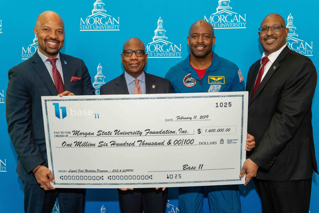 From left, Landon Taylor, Morgan State University President David Wilson, NASA Astronaut Leland Melvin and Dean Marsh, managing director of North America for Dassault Systèmes, participate in a check presentation ceremony presenting Morgan State with a $1.6 million grant to fund a state-of-the-art rocketry lab and launch a student rocketry team. (Photo courtesy of Morgan State University)