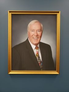 A portrait of Thomas Dewberry hangs in the Maryland Office of Administrative Hearings.