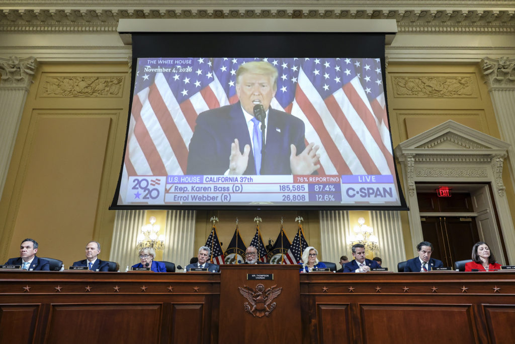 A video of then-President Donald Trump speaking is displayed as the House select committee investigating the Jan. 6 attack on the U.S. Capitol holds a hearing in Washington on Oct. 13, 2022. (Alex Wong/Pool Photo via AP)