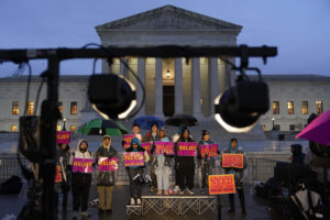 Student debt relief advocates gather outside the Supreme Court on Capitol Hill in Washington on Feb. 27, 2023. Arguments at the Supreme Court over President Joe Biden's student debt cancellation left some borrowers feeling isolated as they heard such a personal subject reduced to cold legal language. (AP Photo/Patrick Semansky)