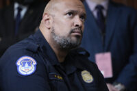 U.S. Capitol Police Sgt. Harry Dunn listens as the House select committee investigating the Jan. 6 attack on the U.S. Capitol holds its final meeting on Capitol Hill in Washington on Dec. 19, 2022. Dunn, who defended the U.S. Capitol on Jan. 6, announced Jan. 3, 2024, that he is running for Congress in Maryland. (AP Photo/Jacquelyn Martin, File)
