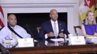 Members of the Maryland Board of Public Works, from left, Treasurer Dereck Davis, Gov. Wes Moore and Comptroller Brooke Lierman listen to testimony about $148.3 million in state budget cuts approved July 17, 2024, in Annapolis. (AP Photo/Brian Witte)
