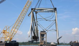 Salvage crews remove debris from the collapsed Francis Scott Key Bridge from the Fort McHenry channel on June 3, 2024. (Photo by Bobby Petty, U.S. Army Corps of Engineers, Baltimore District)