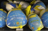 Frozen whole turkey breast is displayed at a Walmart store in Milford, Connecticut, on Nov. 16, 2024. (AP Photo/Peter Morgan)