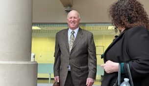 Stephen Snyder leaves the federal courthouse in Baltimore on April 2, 2025, after being sentenced for attempted extortion and related charges. (The Daily Record/Ian Round)