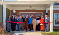 Property management company Pennrose and the Housing Commission of Talbot celebrated the grand opening of the revitalized Doverbrook Apartments complex in Easton. (Courtesy of Pennrose)