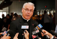 Archbishop Paul Coakley speaks to the media before the Beatification Ceremony for Stanley Rother in Oklahoma City, on Sept. 23, 2017. (AP Photo/Sue Ogrocki, File)