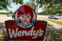 A sign is seen at a Wendy's restaurant Aug. 5, 2025, in Garland, Texas. (AP Photo/Julio Cortez, File)