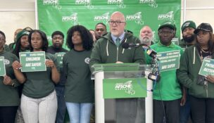 Patrick Moran of the Maryland chapter of the American Federation of State, County and Municipal Employees announces the union is filing Unfair Labor Practice charges against Gov. Wes Moore's administration. (Hannah Gaskill/The Daily Record)
