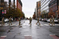 Members of the National Guard cross the street near the site of a shooting of two National Guard members in Washington, D.C., November 30, 2025. (REUTERS/Annabelle Gordon)