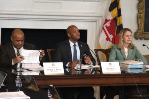 Dereck Davis, Wes Moore and Brooke Lierman voted to approve the contract to build a new courthouse for Maryland's State Supreme Court.