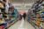 A shopper walks down an aisle in an Albertsons supermarket in Seattle on Dec. 10, 2024. (REUTERS/David Ryder)