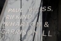Signage is seen outside of the law firm Paul, Weiss, Rifkind, Wharton & Garrison LLP in Washington on Aug. 30, 2020. (REUTERS/Andrew Kelly)