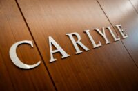 Carlyle signage displays at the office in Manhattan in New York City on Feb. 26, 2025. (REUTERS/Jeenah Moon)