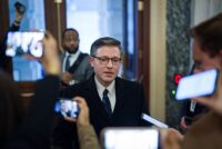 U.S. House Speaker Mike Johnson (R-LA ) speaks with reporters as he departs meeting with members of the House Rules Committee, at the U.S. Capitol on day three of a partial government shutdown in Washington on Feb. 2, 2026. (REUTERS/Al Drago)
