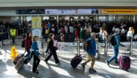 Passengers wait in a TSA security checkpoint queue that stretches through Baltimore/Washington International Thurgood Marshall Airport in Baltimore on March 29, 2026. (REUTERS/Aaron Schwartz)