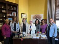 House Judiciary Committee Chair J. Sandy Bartlett, Government, Labor and Elections Committee Chair Melissa Wells, Speaker Joseline Peña-Melnyk. Rules and Executive Nominations Committee Chair Ane Healey, Economic Matters Committee Chair Kriselda Valderrama, Ways and Means Committee Chair Jheanelle Wilkins and Health Committee Chair Heather Bagnall gather in the speaker's office on March 24, 2026. (Hannah Gaskill/The Daily Record)