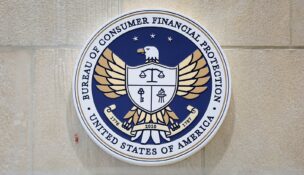The seal of the Consumer Financial Protection Bureau (CFPB) is seen at their headquarters in Washington on May 14, 2021. (REUTERS/Andrew Kelly)