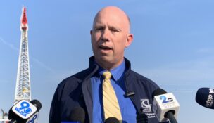 James Harkness, chief engineer at the Maryland Transportation Authority, speaks to reporters about progress on the Francis Scott Key Bridge rebuild, two years after the original bridge collapsed from a ship strike. (Dan Belson/The Daily Record)