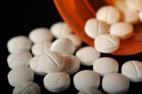 close-up photo of Oxycodone pills by Merrily Cassidy/Cape Cod Times via USA TODAY Network)