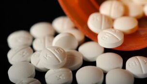 close-up photo of Oxycodone pills by Merrily Cassidy/Cape Cod Times via USA TODAY Network)