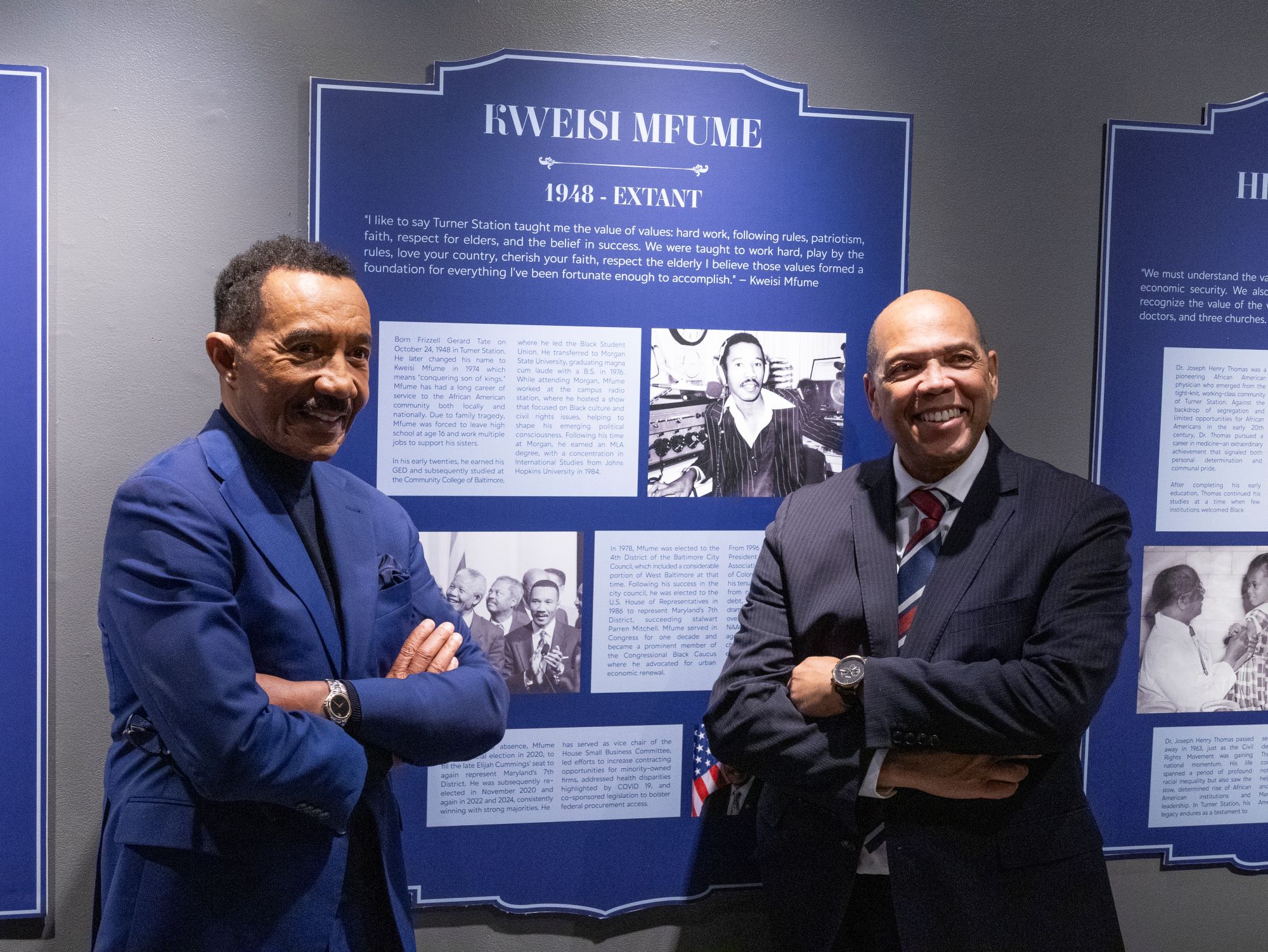 U.S. Rep. Kweisi Mfume (left) and Baltimore County Councilman Julian E. Jones Jr. pose in front of the plaque honoring Mfume. (Eye See You Photography LLC/Zeinab Shafiee/Samantha Trionfo)