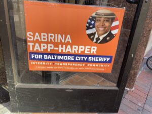 IMG_0497An election sign for Sabrina Tapp-Harper for Baltimore City sheriff is posted on the door of a Mid-Town Belvedere convenience store on June 4, 2026. (Kendyl Kearly/The Daily Record)