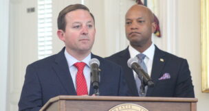 Senate President Bill Ferguson and Gov. Wes Moore speak at a bill signing on April 14, 2026. (Hannah Gaskill/The Daily Record)