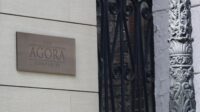 A sign marks the Agora Cos. headquarters in Baltimore's Mount Vernon neighborhood.