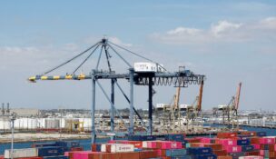 Shipping containers are stacked at a terminal at the port of Los Angeles in Long Beach, California, March 10, 2026. (REUTERS/Caroline Brehman/File Photo)