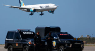 A plane carrying Venezuelan migrants deported from the United States approaches landing at Simon Bolivar International Airport, in Maiquetia, Venezuela, on Jan. 19, 2026. (REUTERS/Marco Bello)