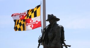 The Maryland state flag flies at half-mast behind Ocean City's statue that honors firefighters across the world for their sacrifices. A ceremony was held in front of the statue on Sept. 11, 2019 to honor those affected by the attacks on Sept. 11, 2001. (USA TODAY Network via Reuters Connect)