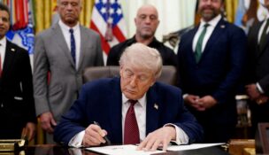 President Donald Trump signs an executive order encouraging more research into ibogaine, next to U.S. Health and Human Services (HHS) Secretary Robert F. Kennedy Jr., Joe Rogan, and Americans for Ibogaine CEO W. Bryan Hubbard, in the Oval Office of the White House in Washington on April 18, 2026. (REUTERS/Nathan Howard/File Photo)