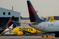 A Spirit Airlines aircraft sits at Miami International Airport in Florida, May 2, 2026. Spirit abruptly canceled flights overnight, stranding passengers and staff around the U.S., Caribbean and Latin America, after collapsing under financial pressures that included a sharp rise in fuel costs due to the Iran war. (REUTERS/Nathan Howard/File Photo)