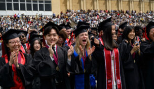Audrey Hasson, from Ellicott City, in the center, wearing a blue stole, graduated this month with a computer science degree from Carnegie Mellon University. (Jeff Swensen/For The Washington Post)