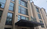 The former Hickey-Freeman building is reborn as Tailor Square and still features the Hickey-Freeman logo at the building's entrance. (Photo provided by Home Leasing)