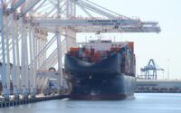 A cargo ship is berthed at the Port of Baltimore as federal authorities announce criminal charges in the Francis Scott Key Bridge collapse on May 12, 2026. (Dan Belson/The Daily Record)