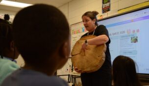 Rachel Bayer, a student teacher and former federal worker, teaches a lesson on April 22, 2026. (Alexander Taylor/Capital News Service)
