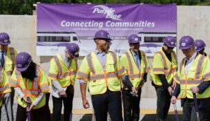 Gov. Wes Moore (D) and other Maryland officials gather to celebrate the completion of the Purple Line in Silver Spring on May 7, 2026. (Jordan Tovin/For the Washington Post)