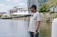 Capt. Tim Blanchard stands on a pier at the Yards Marina, where he runs a tackle shop. (Jordan Tovin/For The Washington Post)