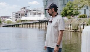 Capt. Tim Blanchard stands on a pier at the Yards Marina, where he runs a tackle shop. (Jordan Tovin/For The Washington Post)