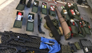 Illegal high-capacity magazines and an assault rifle along with multiple guns, ammunition are seen in this Long Beach Police Department photo in Long Beach, California, released on August 21, 2019. (Courtesy LBPD/Handout via REUTERS)