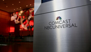 A view shows a signage of Comcast and NBC Universal in the lobby of the corporate headquarters of Comcast, which announced plans to spin-off the bulk of its fading NBCUniversal cable TV networks, including MSNBC and CNBC, in Philadelphia, November 20, 2024. (REUTERS/Bastiaan Slabbers)